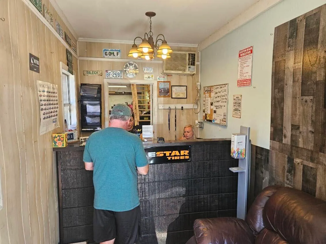 A customer at the Glenns Bay Automotive front counter